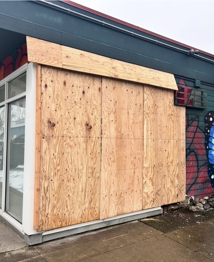 Emergency board-up securing a damaged commercial property