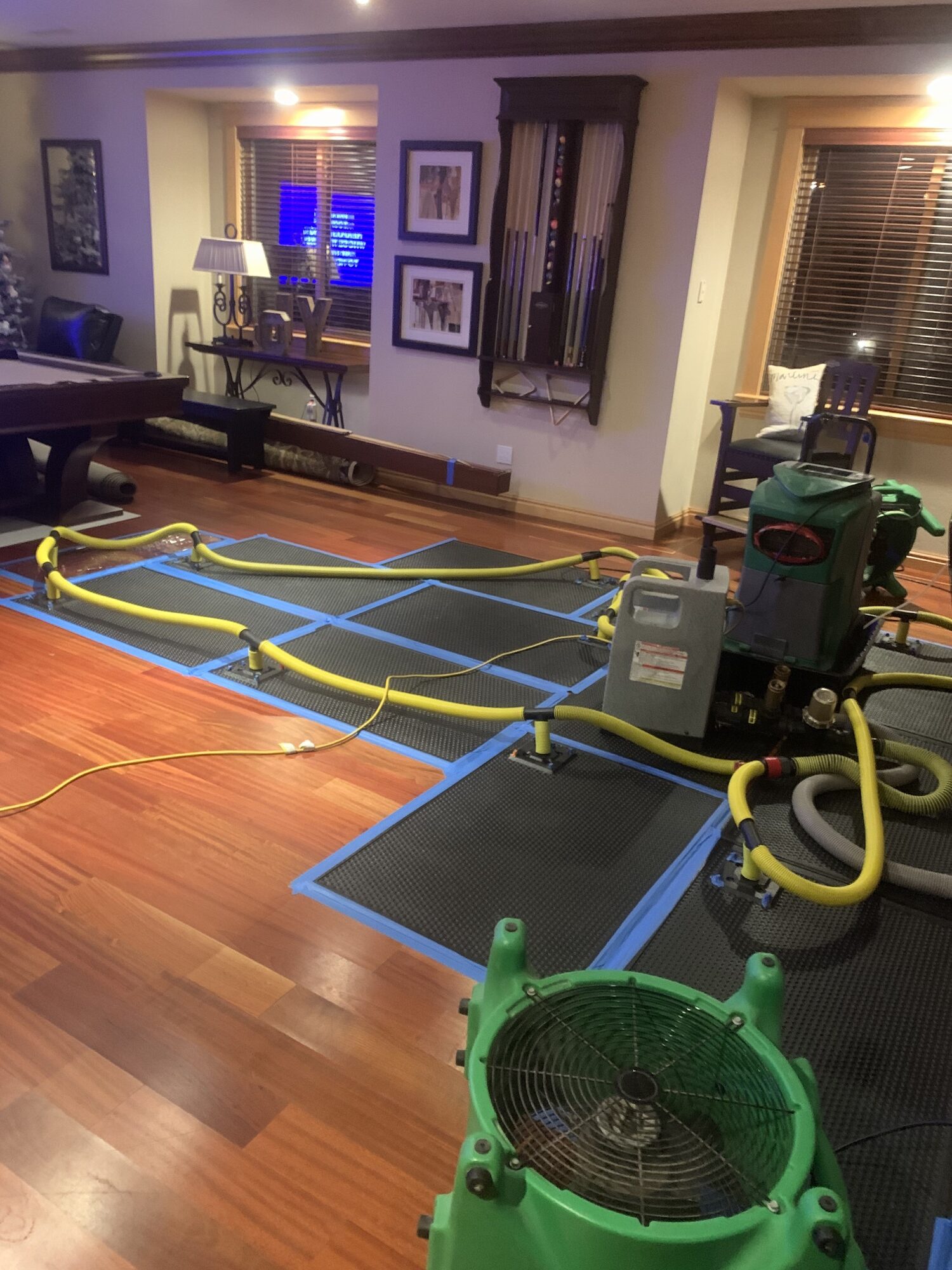 Water mitigation equipment drying a customer property